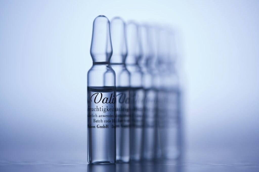 Medical vial representing a review of glutathione injection evidence and safety