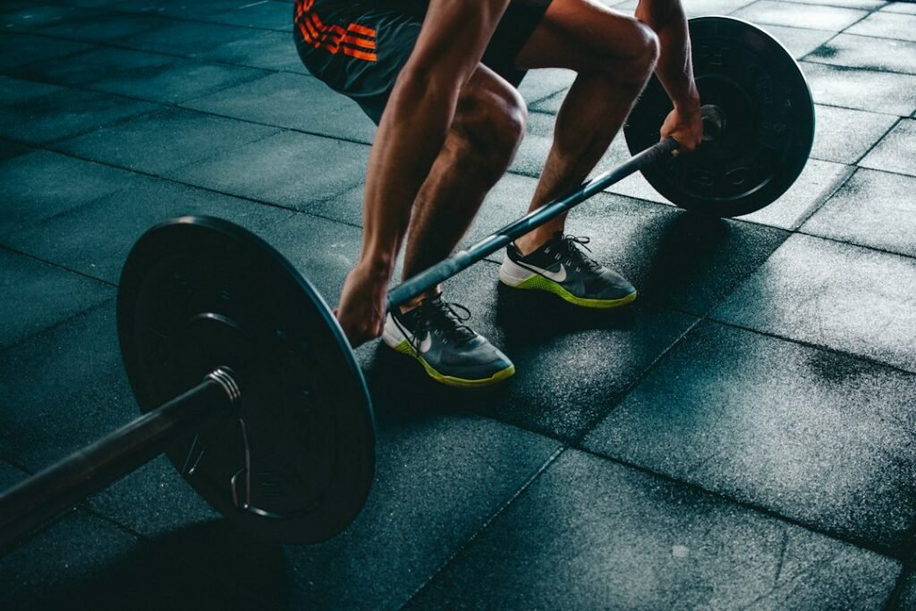 Man strength training as part of a healthy plan for weight and hormone health