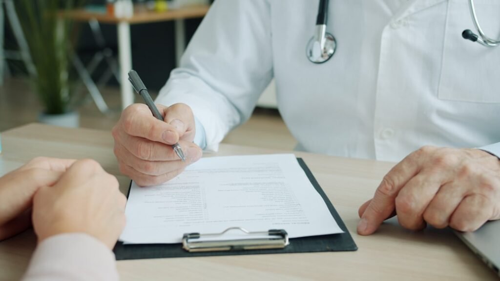 Clinician reviewing TRT side effects during a patient consultation